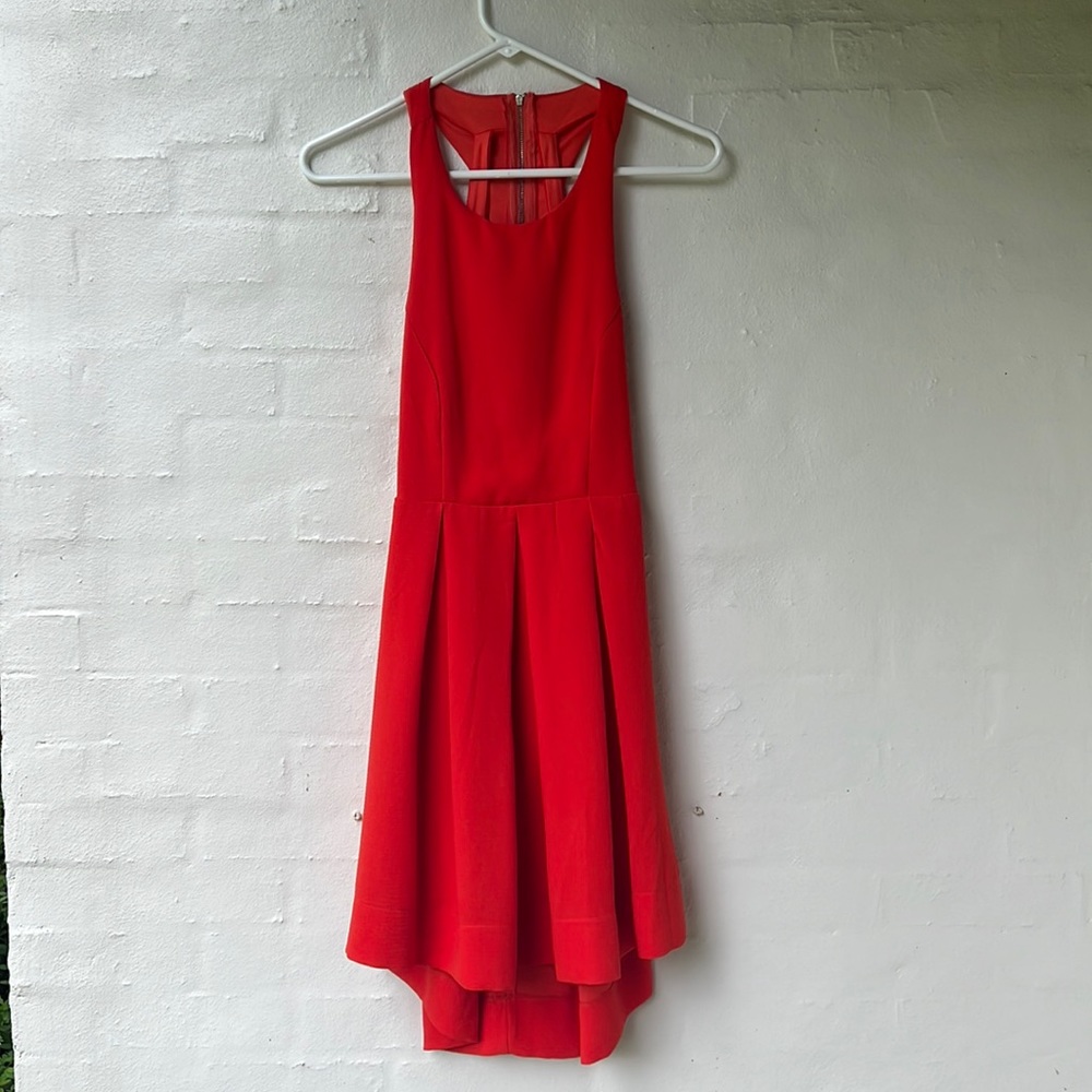 Orange Dress with razorback.